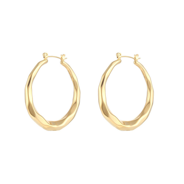 Boucles d`oreilles Huggie Hoop italienne en or
18 carat.1/2"