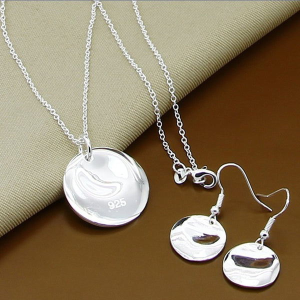 Ensemble de bijoux en argent S 925
collier et boucles