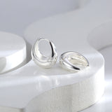 Boucle d`oreilles Huggie Hoop rétro
en  or et argent sterling 925